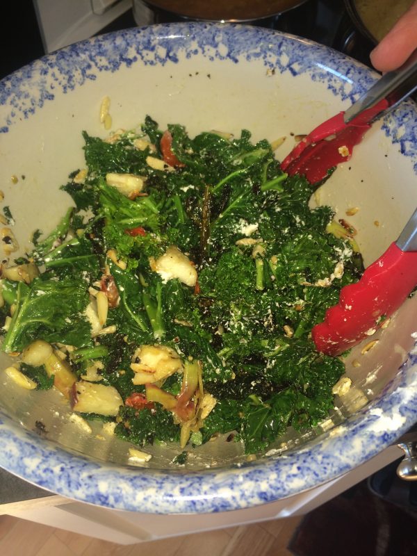 Sauteed kale in olive oil, salt, pepper, goat cheese, sauteed aslivered almonds and sauteed apples...thanks Jay Nutt for the inspiration.